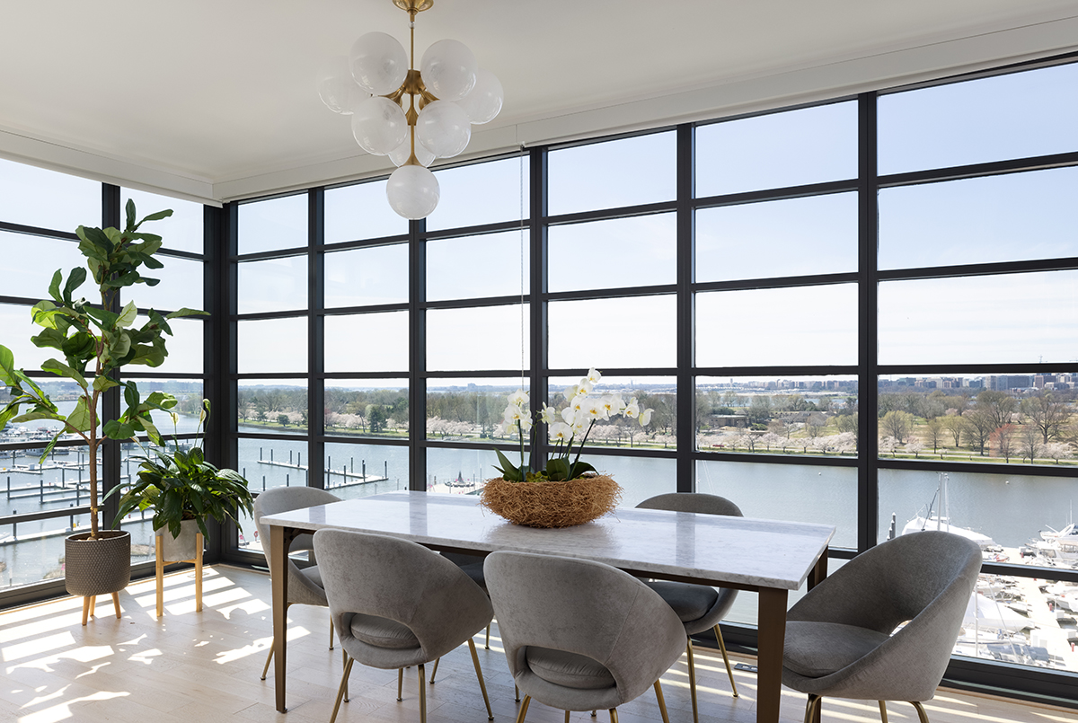 Dining area with waterfront view in DC condo