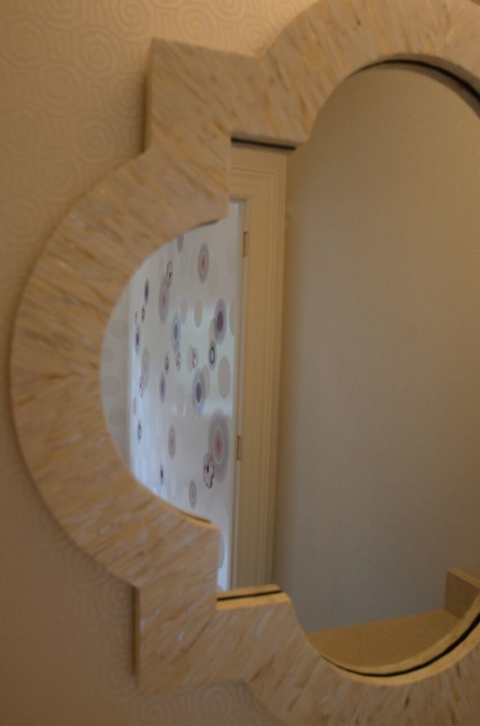 Close-up of mirror in Salle de Bains in DC Design House 2016