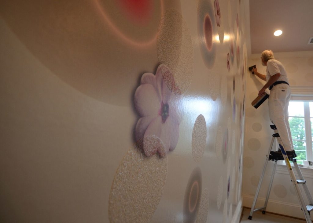 Installation in progress of Eykon's Source One Ulf Moritz Wall Couture's Lavish Swag pattern