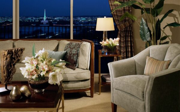 Living room with night view of Potomac and Washington DC