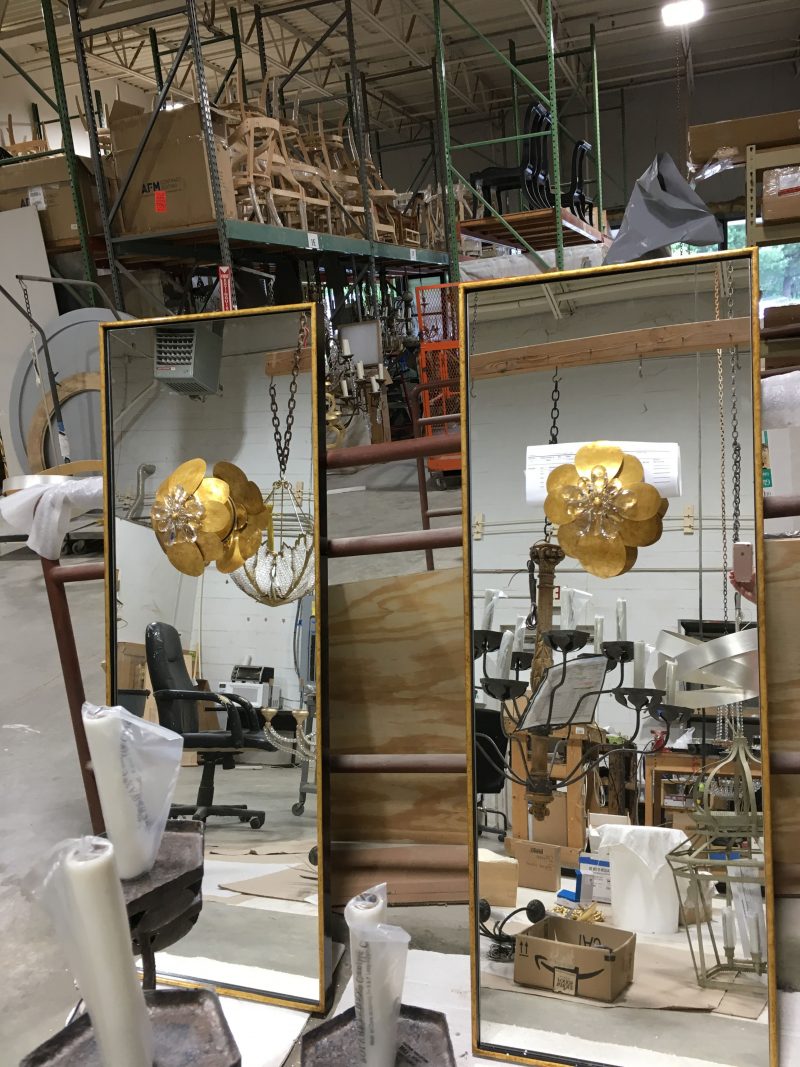 Two, custom full-length mirrors with metal and glass flowers at Niermann Weeks studio