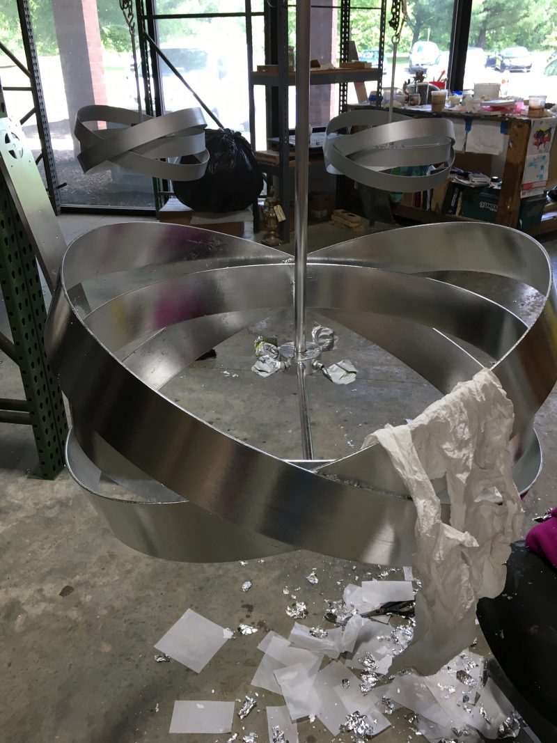 Silver leaf application on modern light fixture
