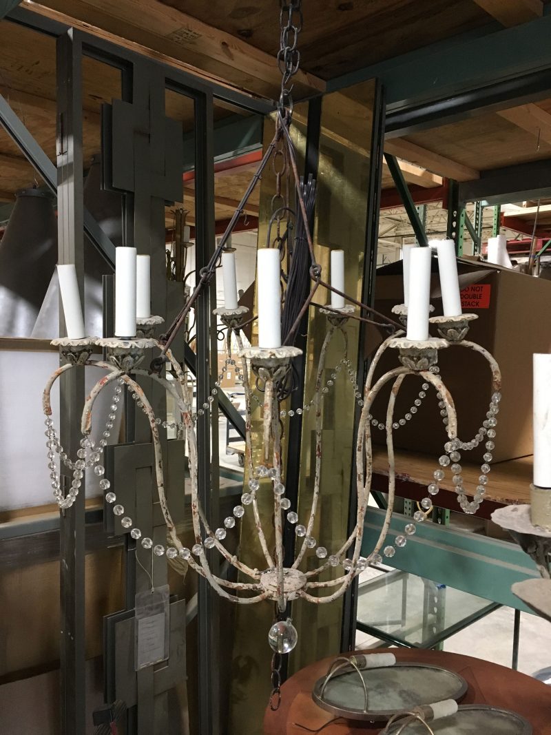 Traditional chandelier with crystal swags at Niermann Weeks studio