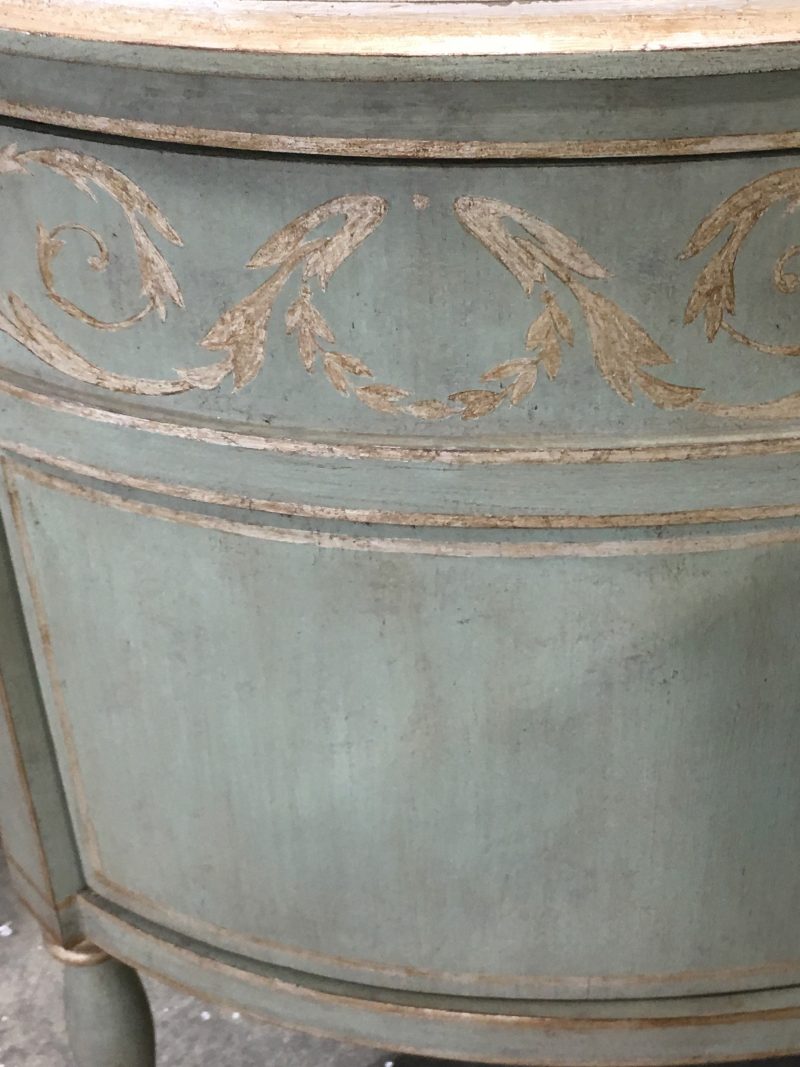 Close-up of details on painted Niermann Weeks demilune console