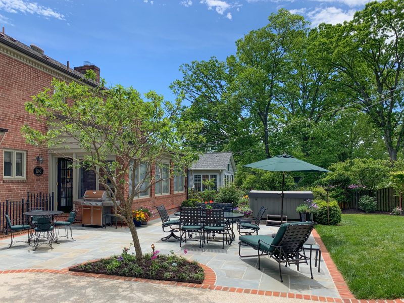 Full view of outdoor living space with flagstone patio