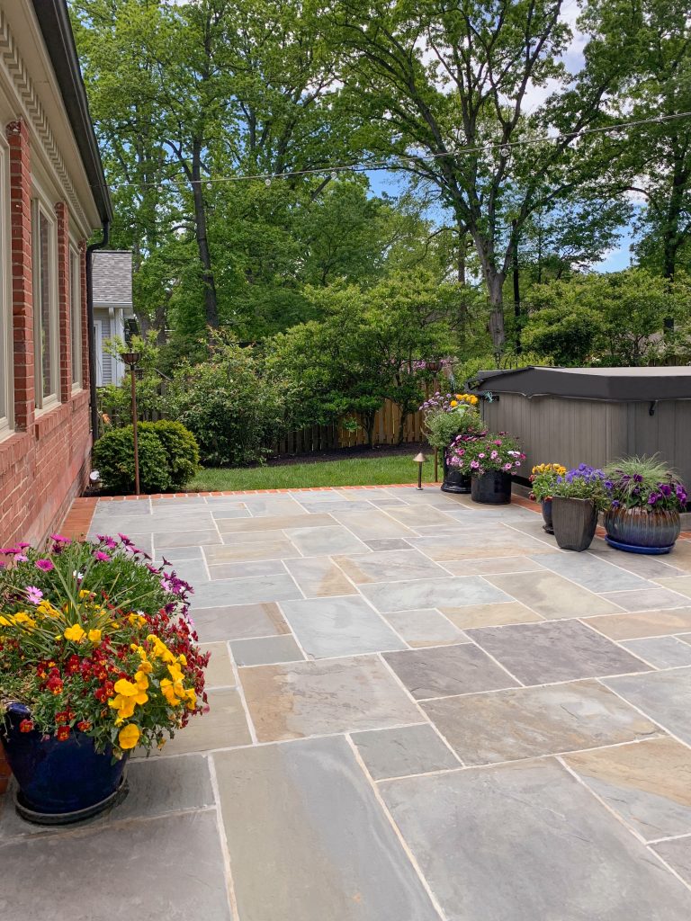 Section of Houck flagstone patio reserved for new seating area 