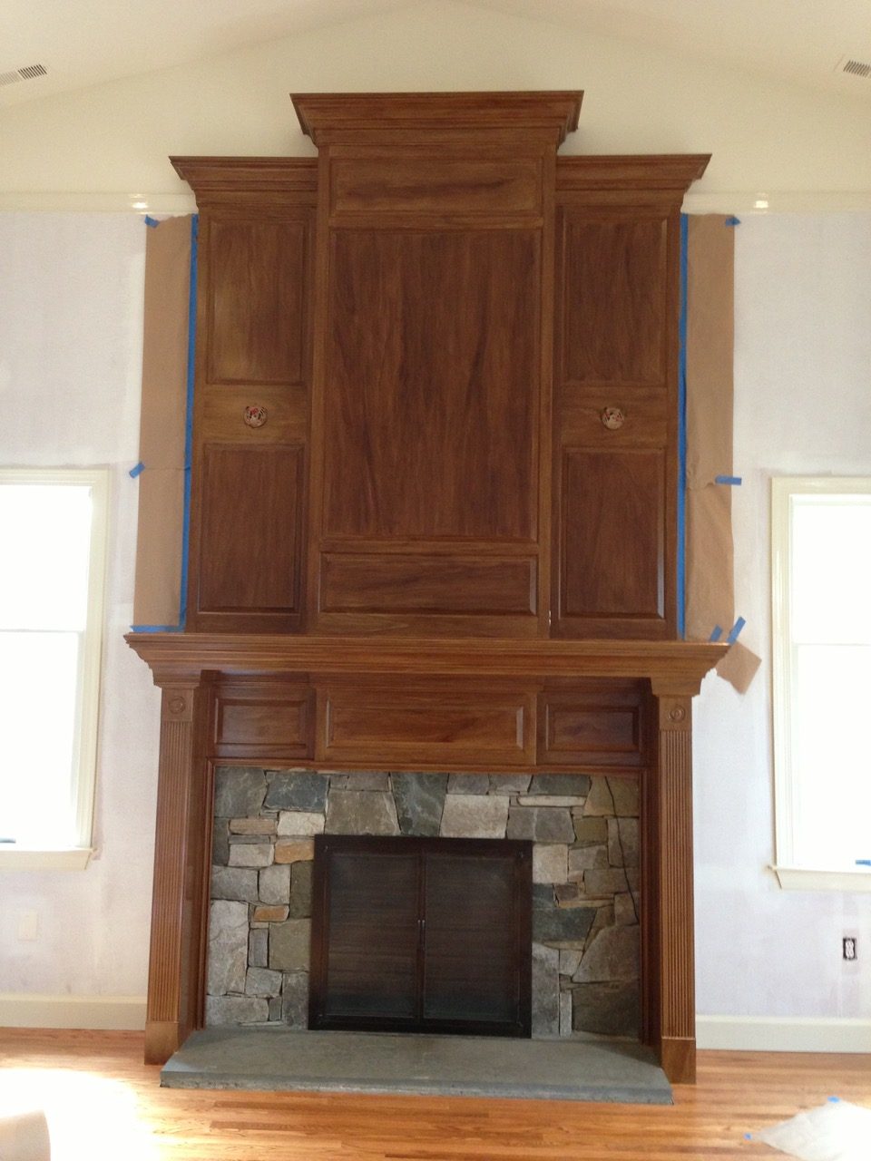 Arlington family room fireplace with new mahogany faux finish