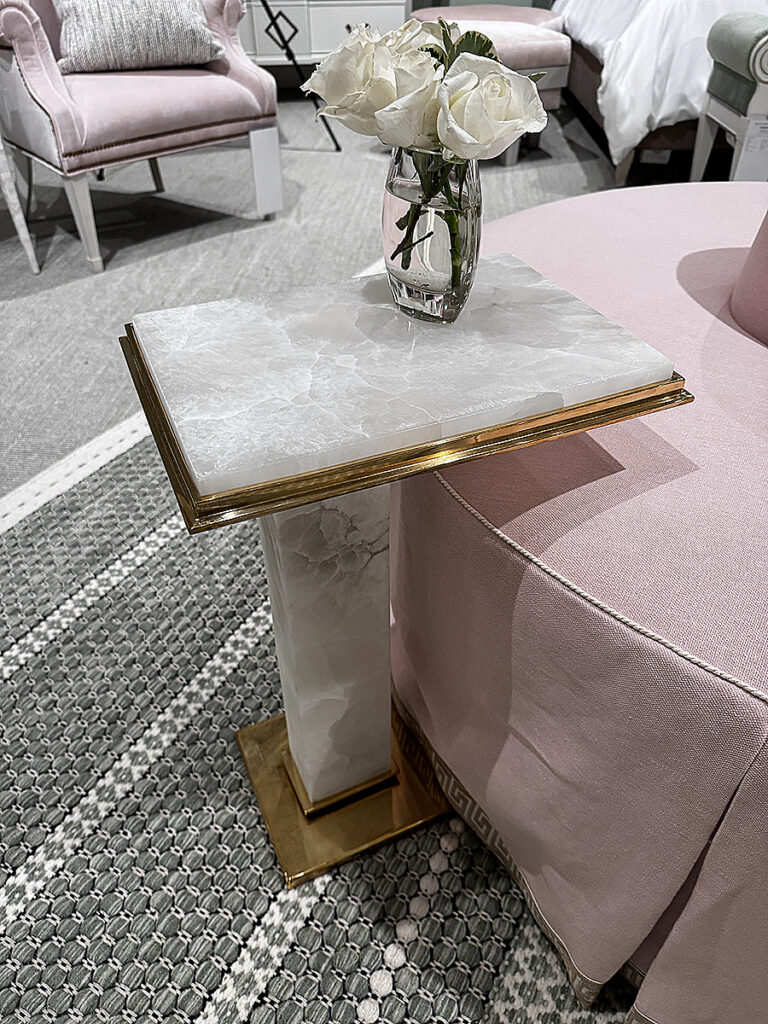 Alabaster topped drinks table with and brass base and accent trim.