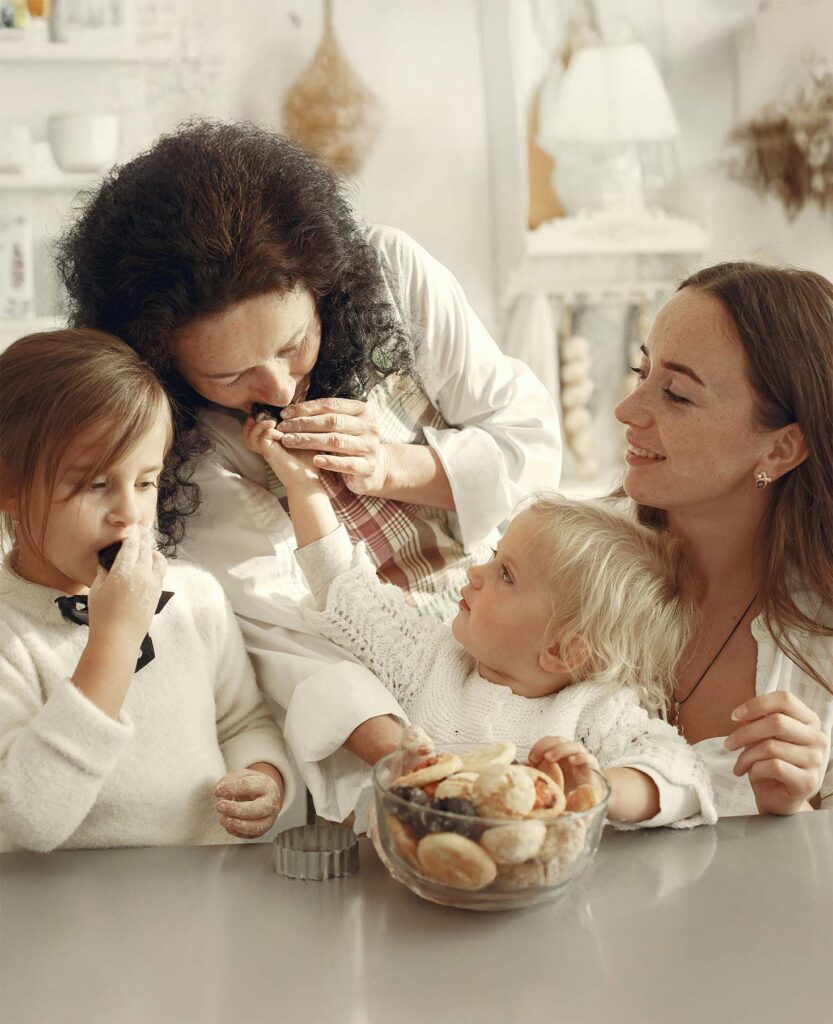 Family baking together in a kitchen.