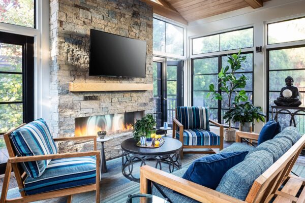 All season porch wth fireplace and seating area.