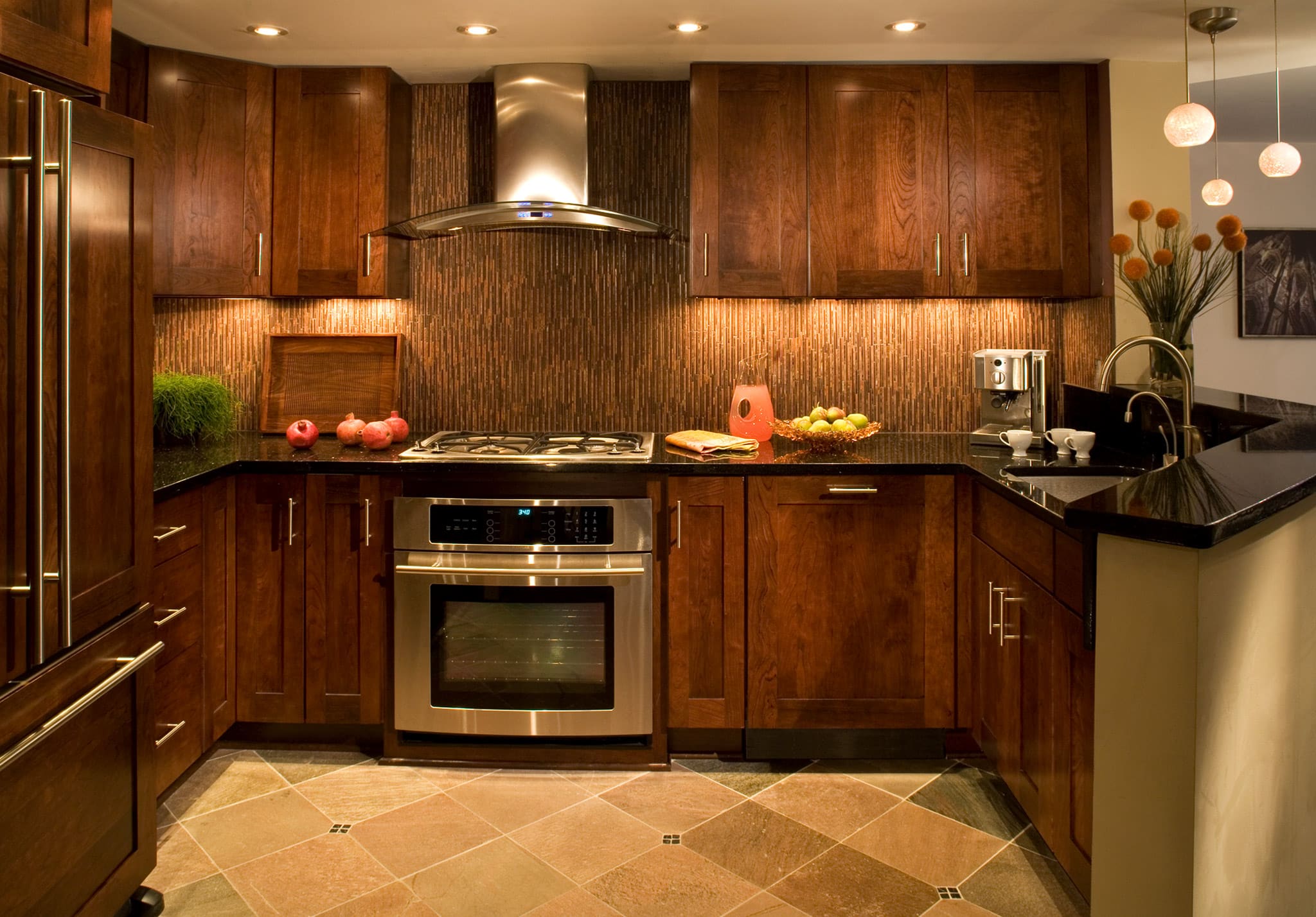 Renovated kitchen design featuring under-cabinet lights.