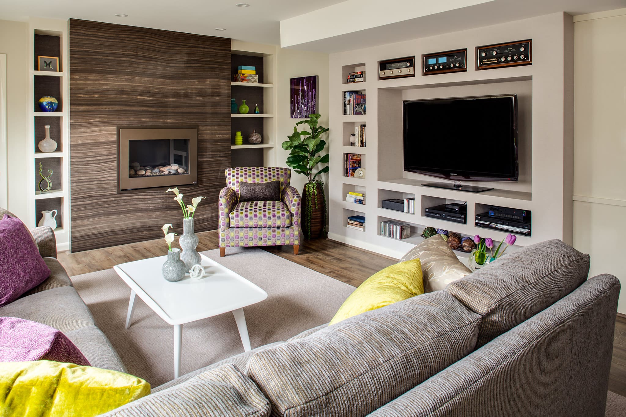 Modern basement remodel, fireplace, media room, sectional in Arlington, VA by A. Houck Designs.