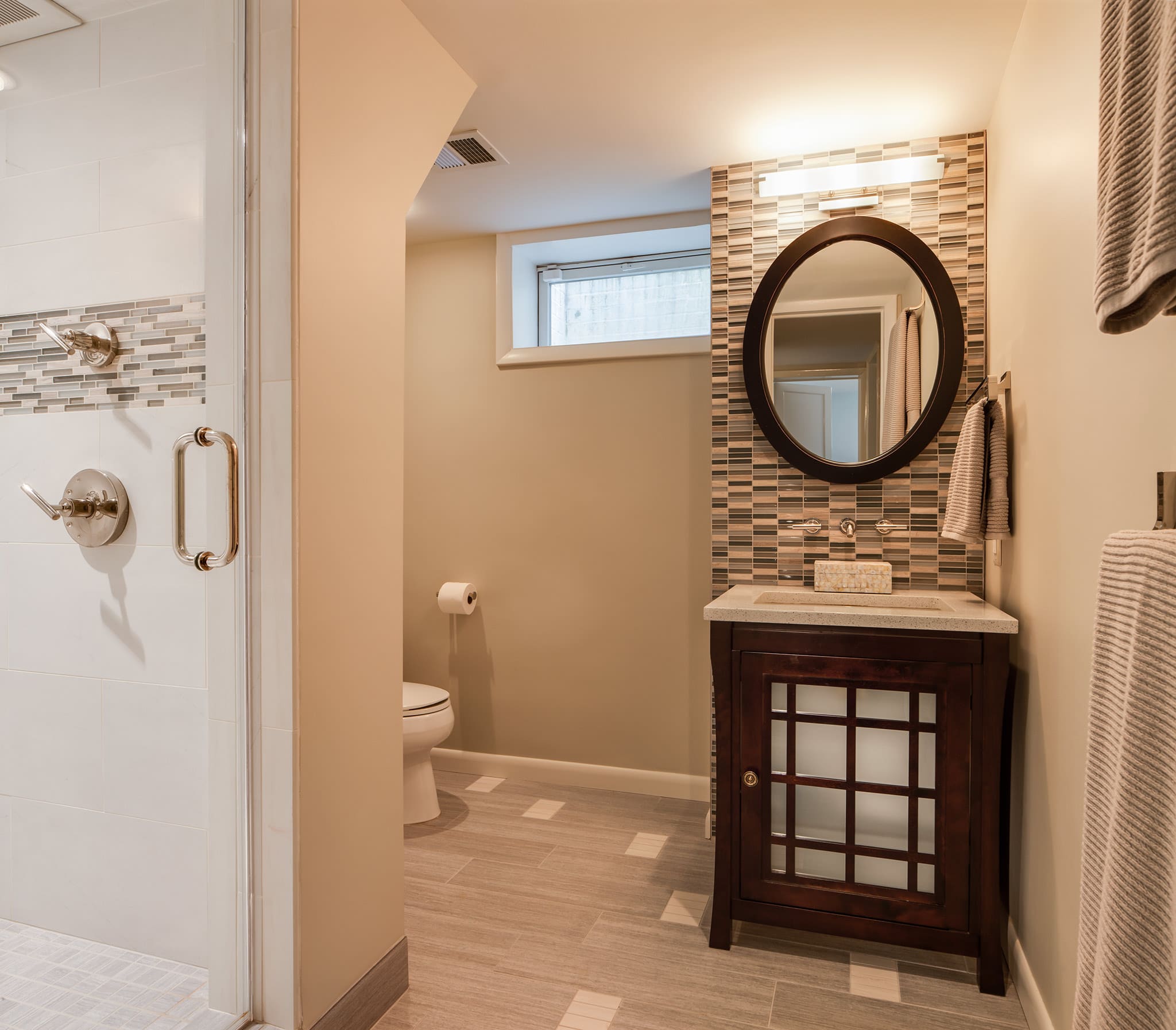 Mosaic backsplash and shower detail, modern design, bathroom by A. Houck Designs.