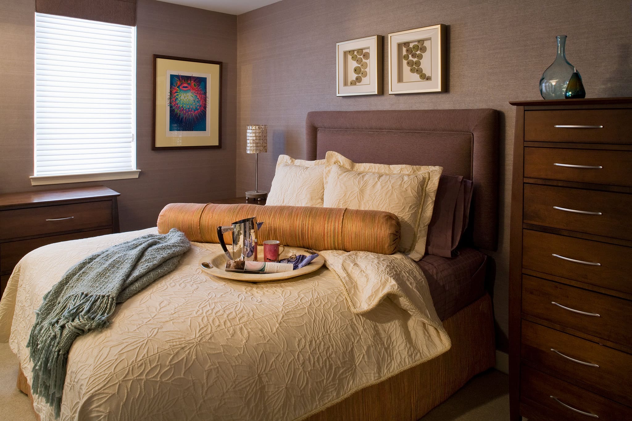 Warm and inviting bedroom in Arlington, VA by A. Houck Designs.