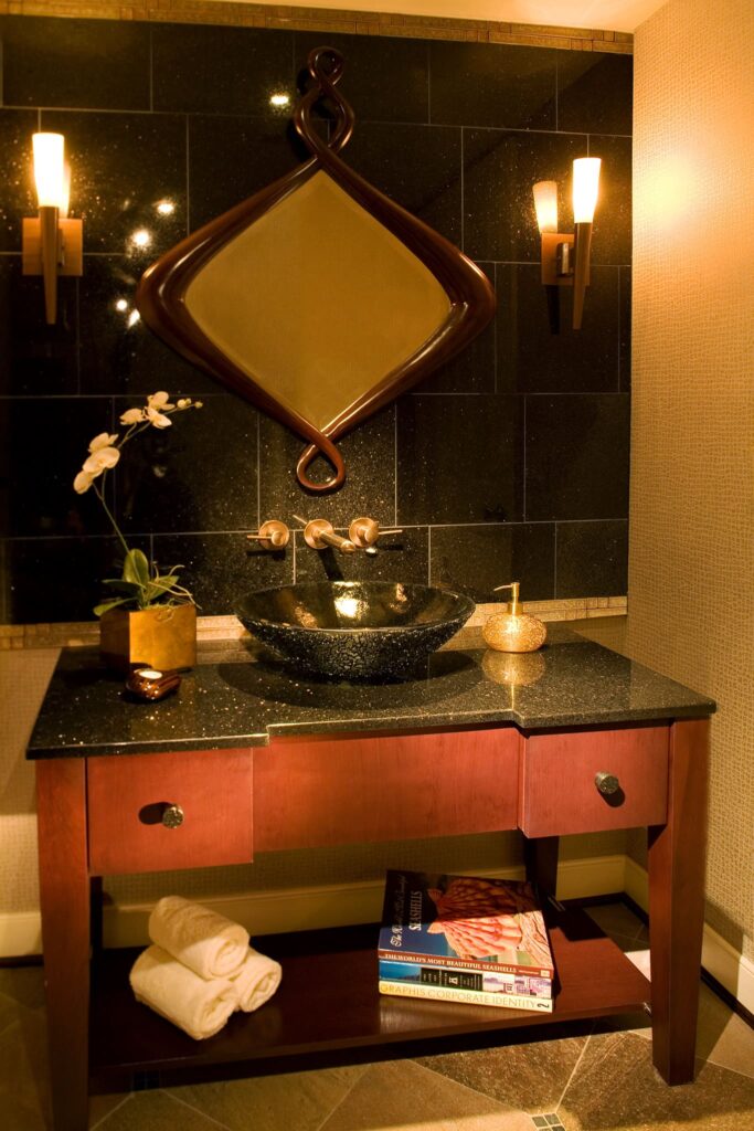 Modern with clean lines powder room by A. Houck Designs.
