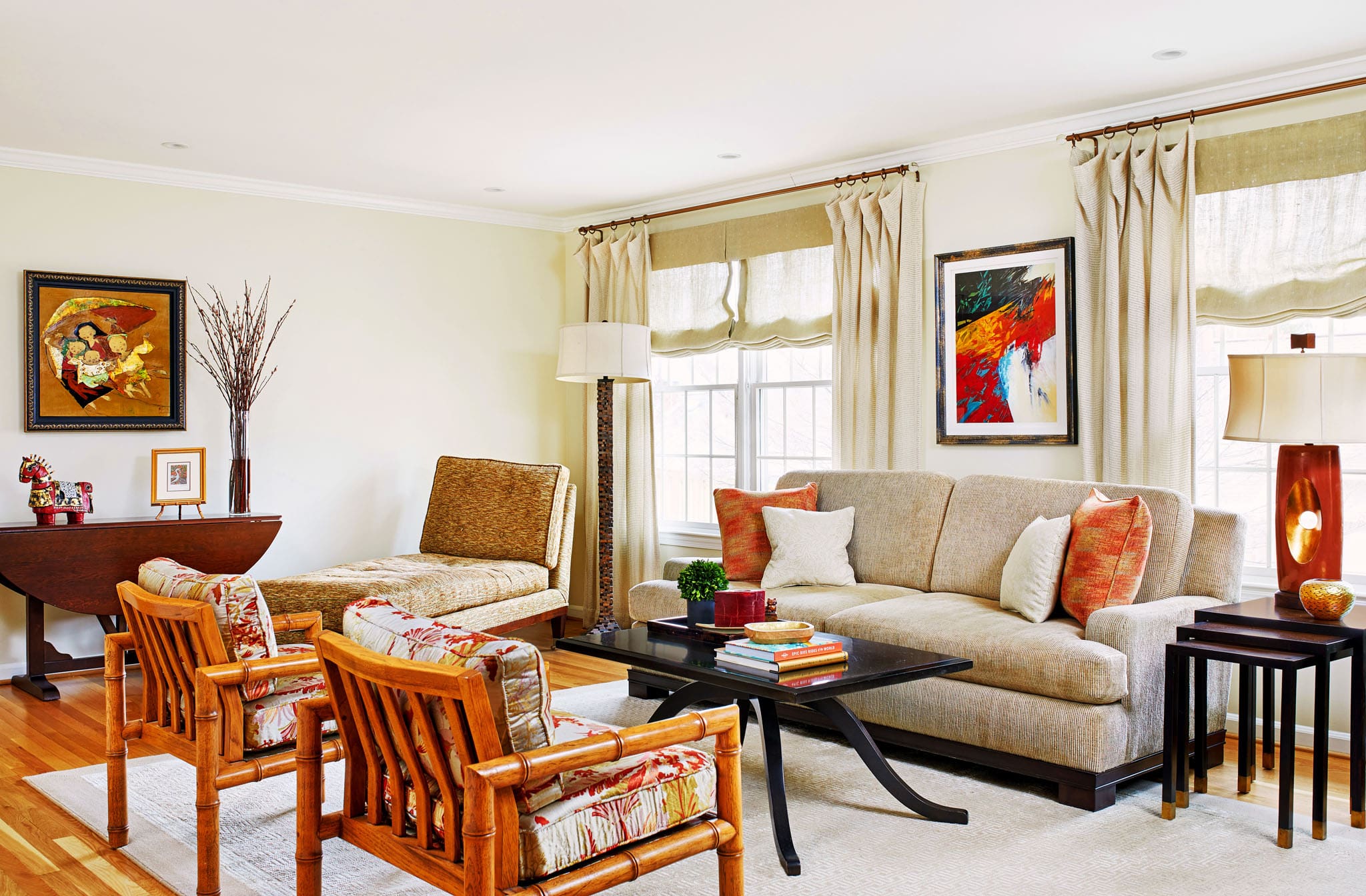 Vivid colors in bright living room by A. Houck Designs.